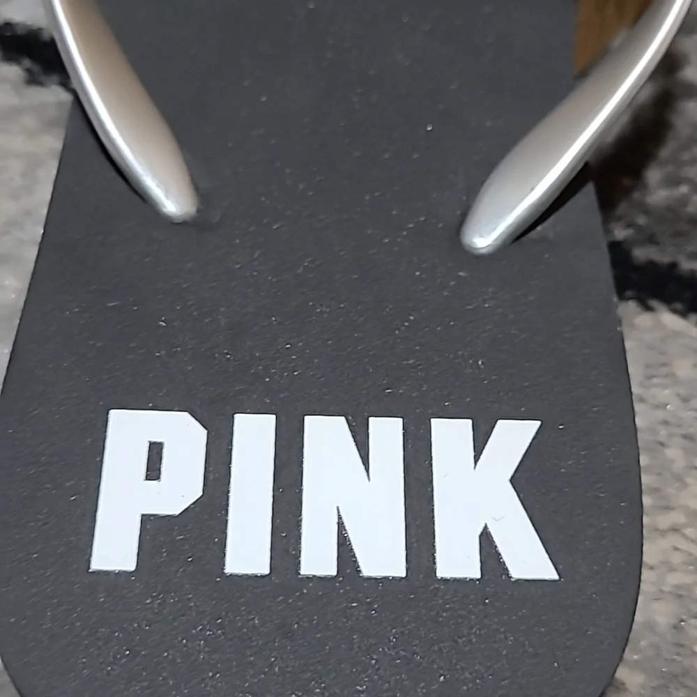VS PINK BLACK SILVER LOGO FLIP FLOPS SANDALS